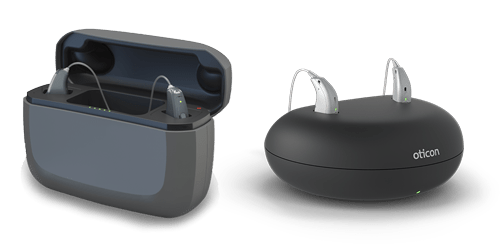 ReSound and Oticon rechargeable hearing aids pictured with their chargers